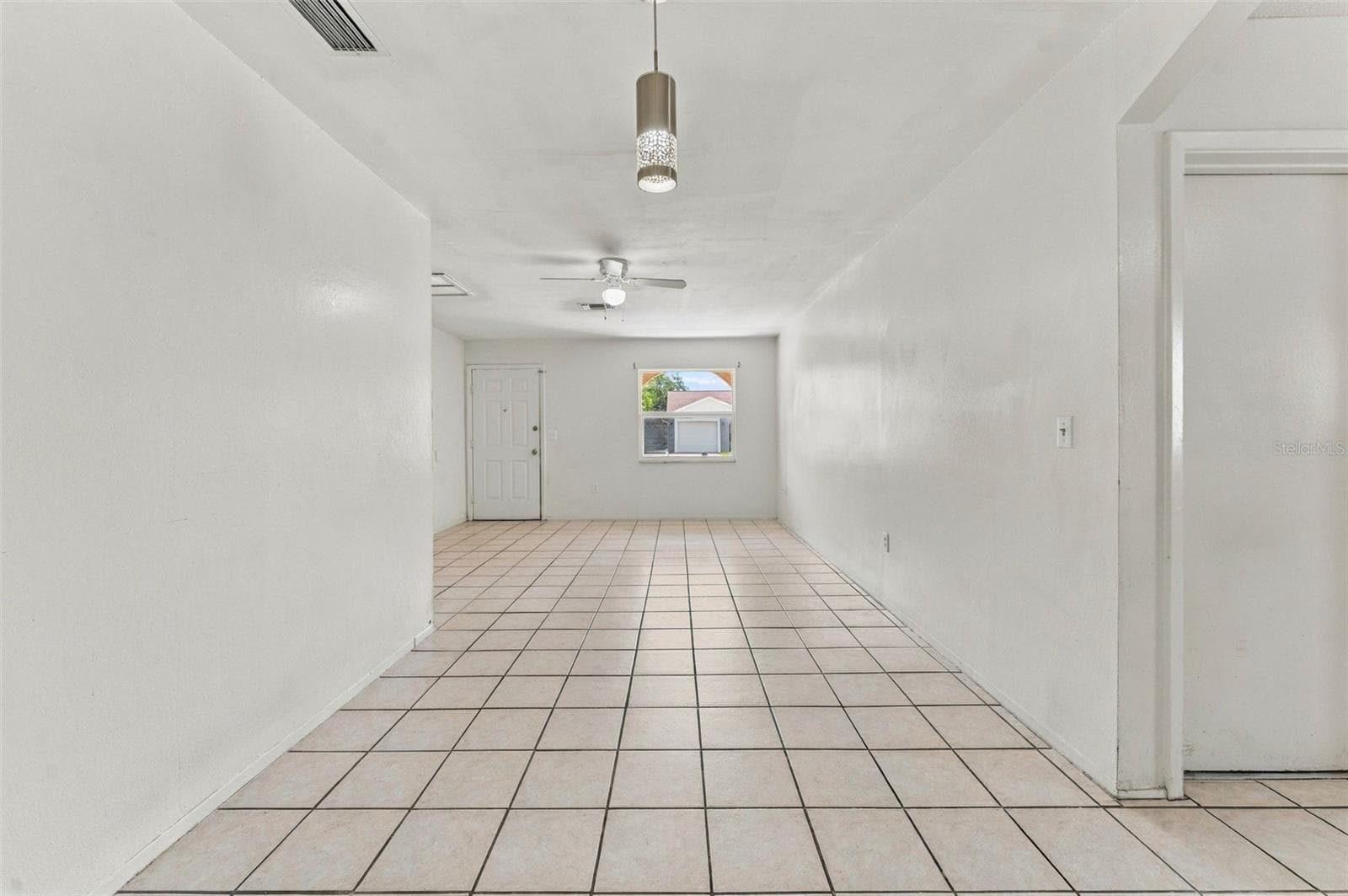 Bright & Open Living Area - 7303 RIVERBANK DR, NEW PORT RICHEY