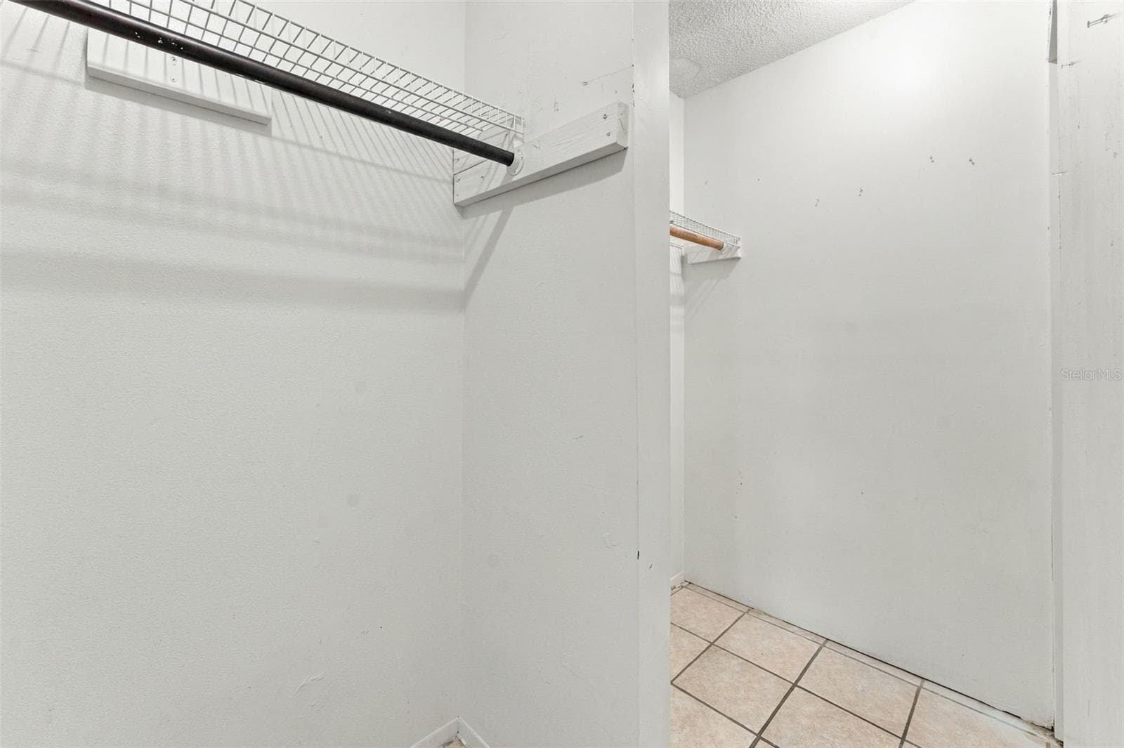 Primary Bedroom - Walk-in Closet - 7303 RIVERBANK DR, NEW PORT RICHEY