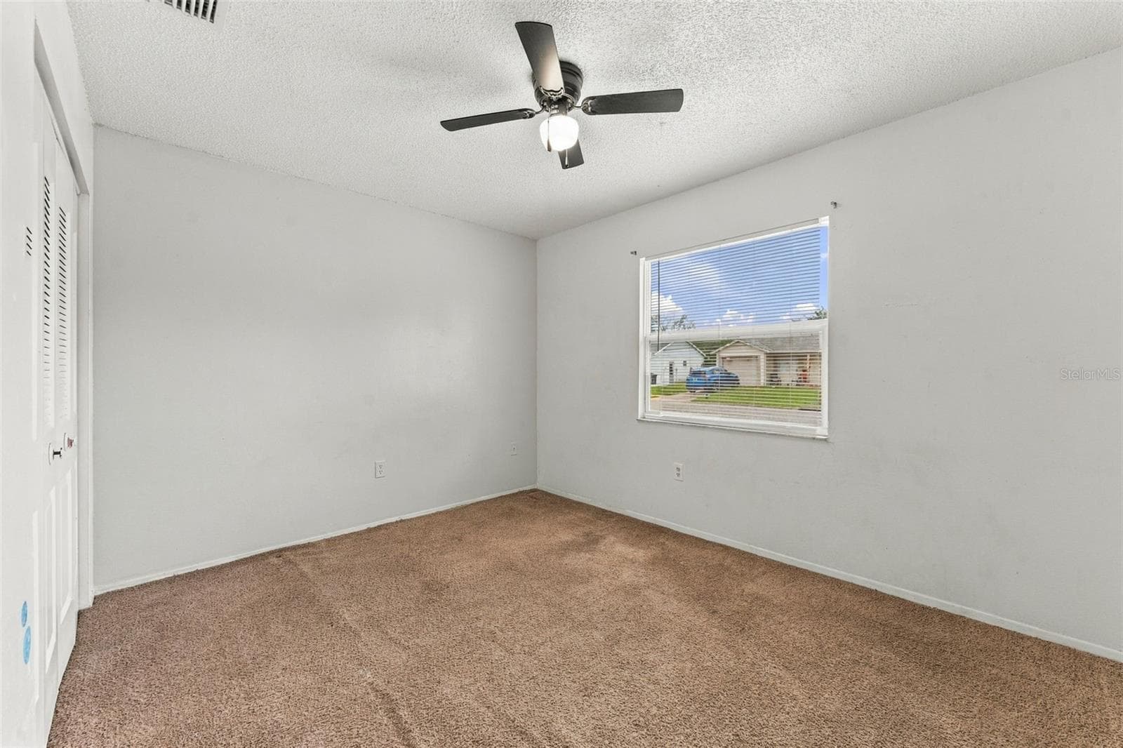 Bedroom #2 with Ceiling Fan - 7303 RIVERBANK DR, NEW PORT RICHEY