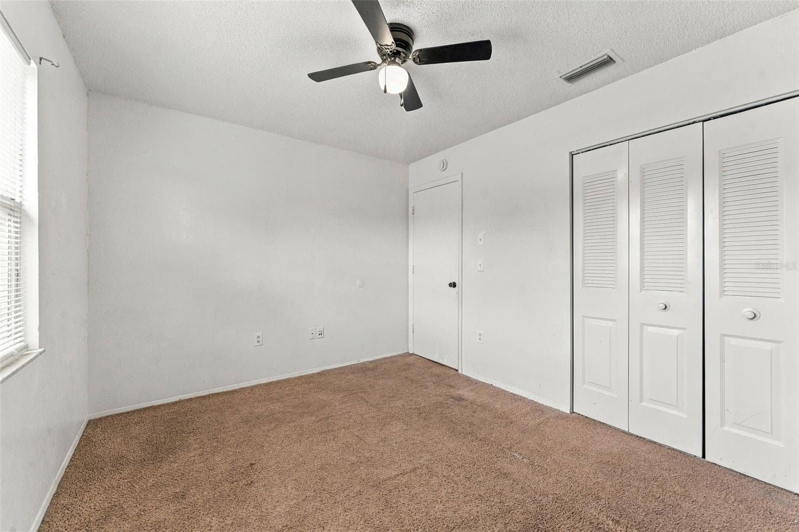 Bedroom 2 with Built-in Closet - 7303 RIVERBANK DR, NEW PORT RICHEY