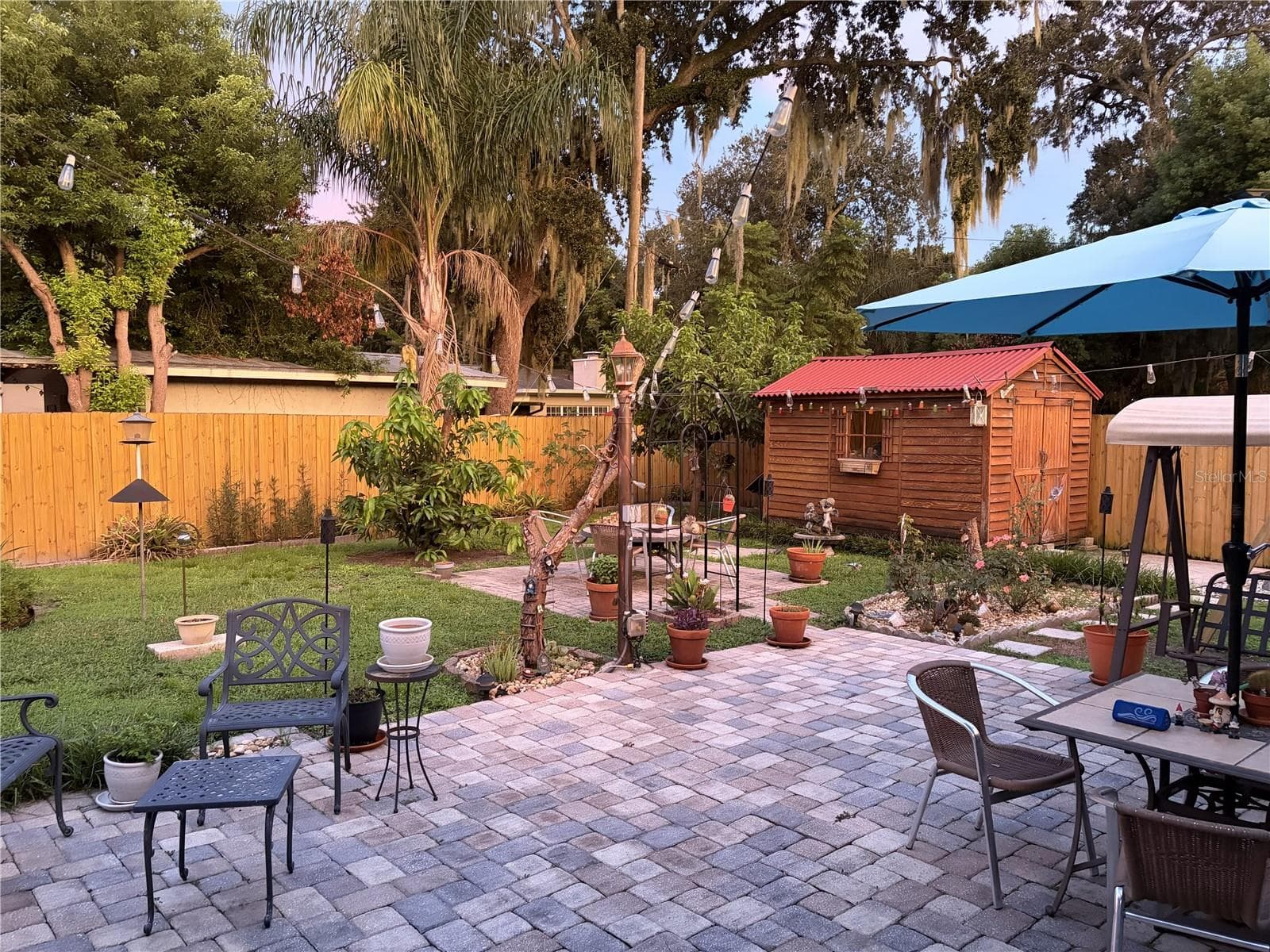 The backyard is for entertaining. - 4511 LONGWORTH DR, ORLANDO