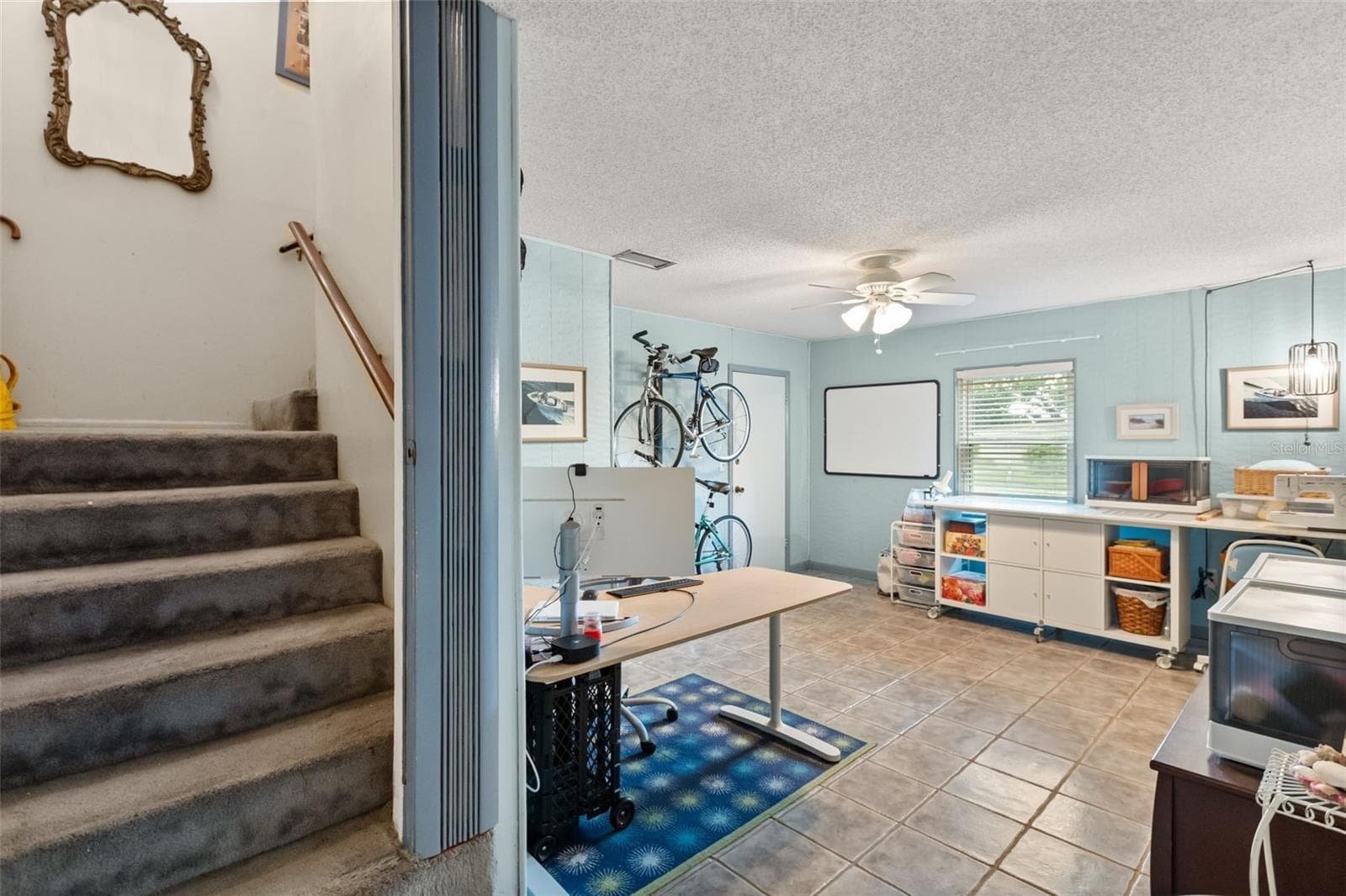 Stairwell to upstairs and one of the downstairs bonus rooms. - 4511 LONGWORTH DR, ORLANDO