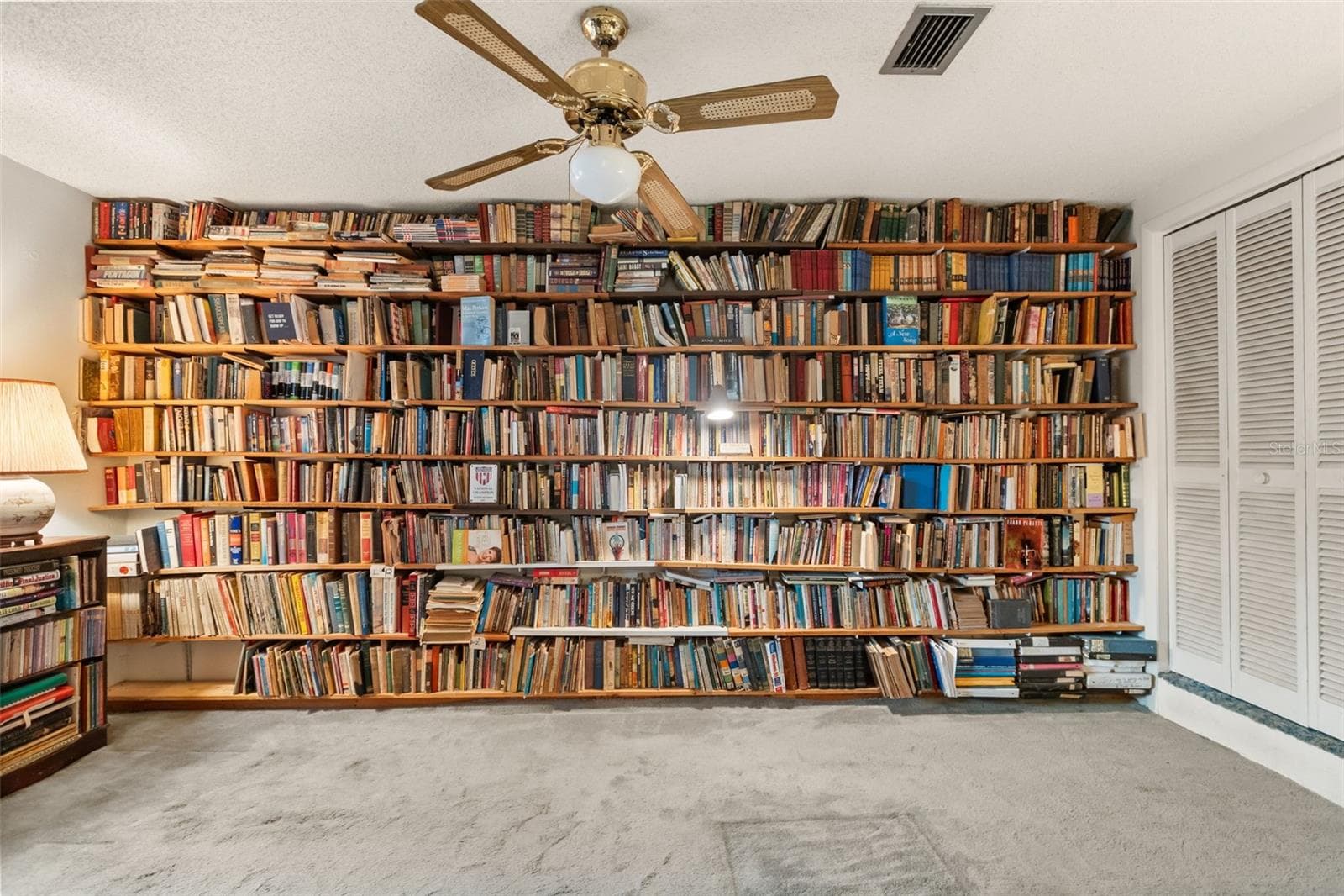 Bedroom 5 has a built-iin bookshelf and walk-in closet. - 4511 LONGWORTH DR, ORLANDO