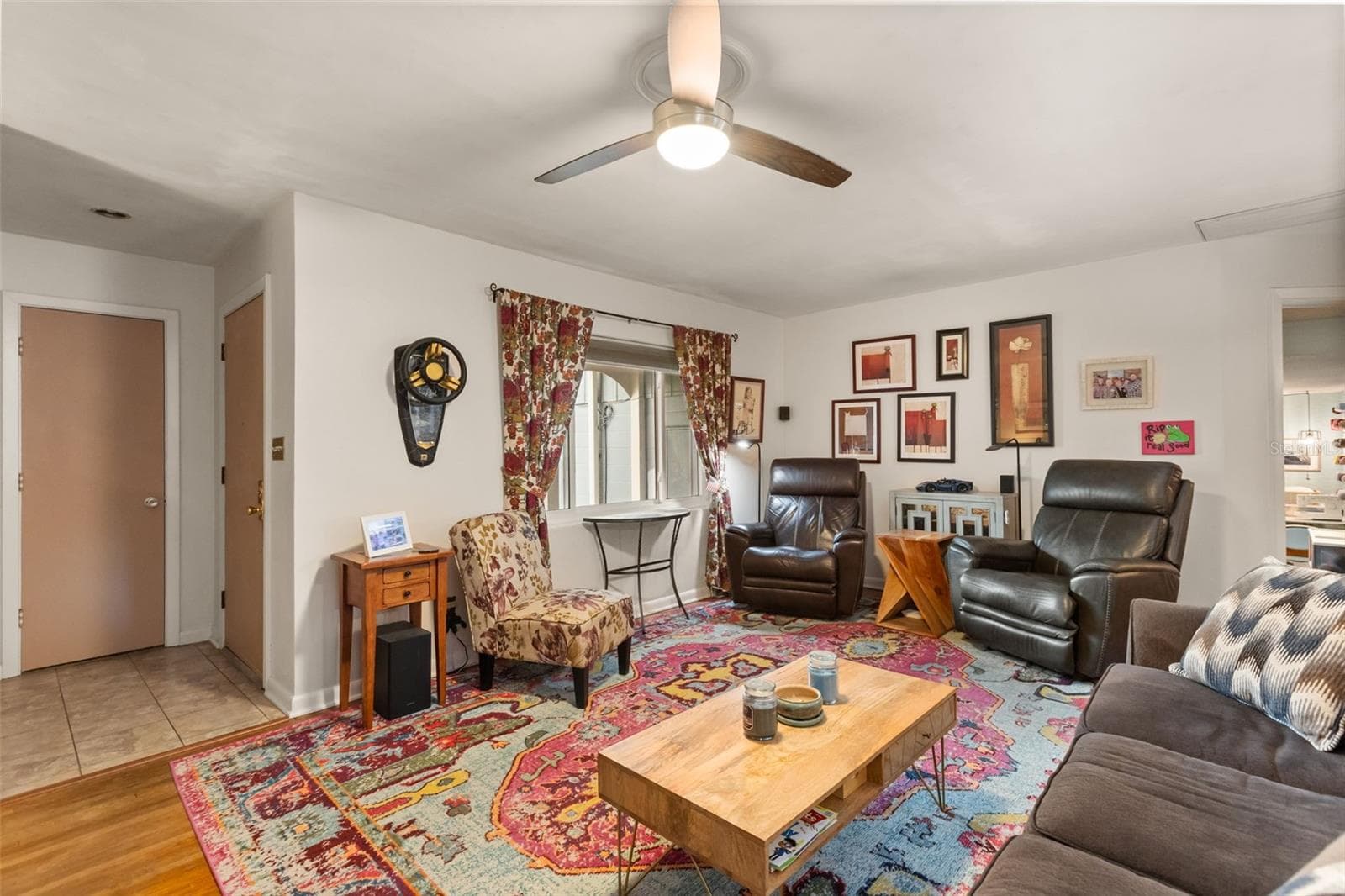 Coat closet is straight ahead and front door is to the right of it. The living room has beautiful original hardwood floors. - 4511 LONGWORTH DR, ORLANDO