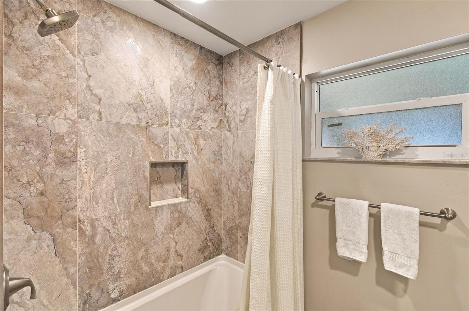 Tiled shower and tub enhances the 2nd bath - 4501 TRASK ST, TAMPA