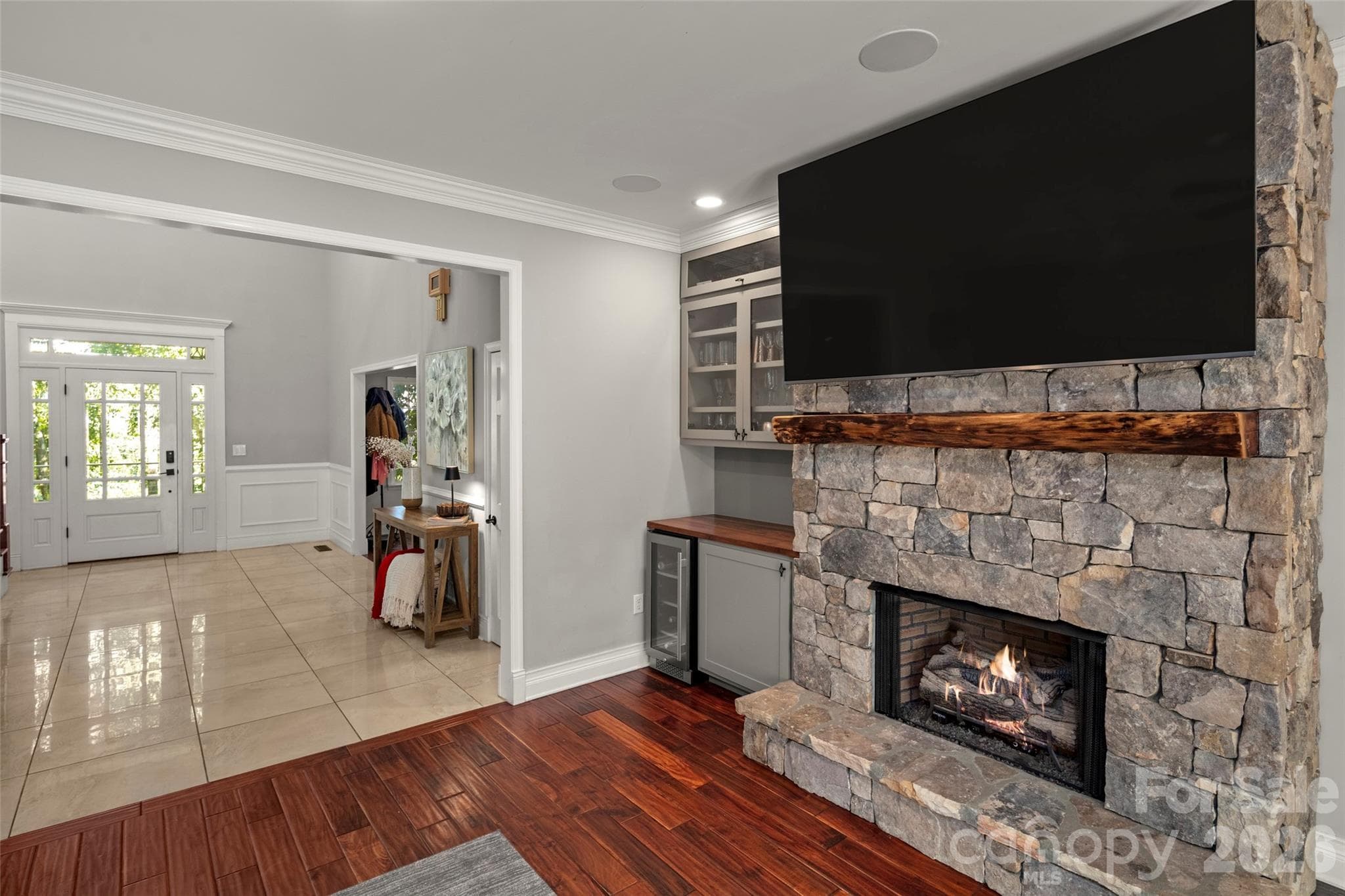 Living room features stone fireplace Brazilian cherry floors - 349 View Rock Lane, Hendersonville