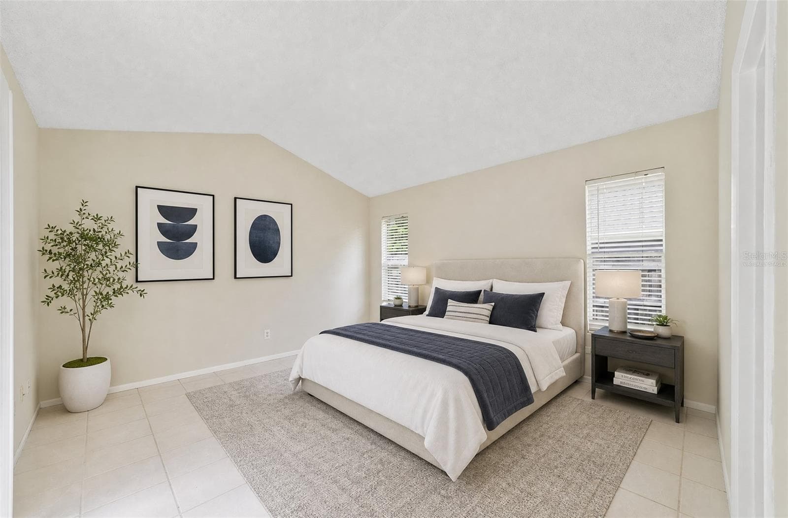 The desirable SPLIT-BEDROOM FLOOR PLAN provides privacy for the Primary Suite, which is tucked away from the secondary bedrooms and features its own DIRECT ACCESS to the back patio and yard. Virtually Staged - 713 MEADOWSIDE CT, ORLANDO