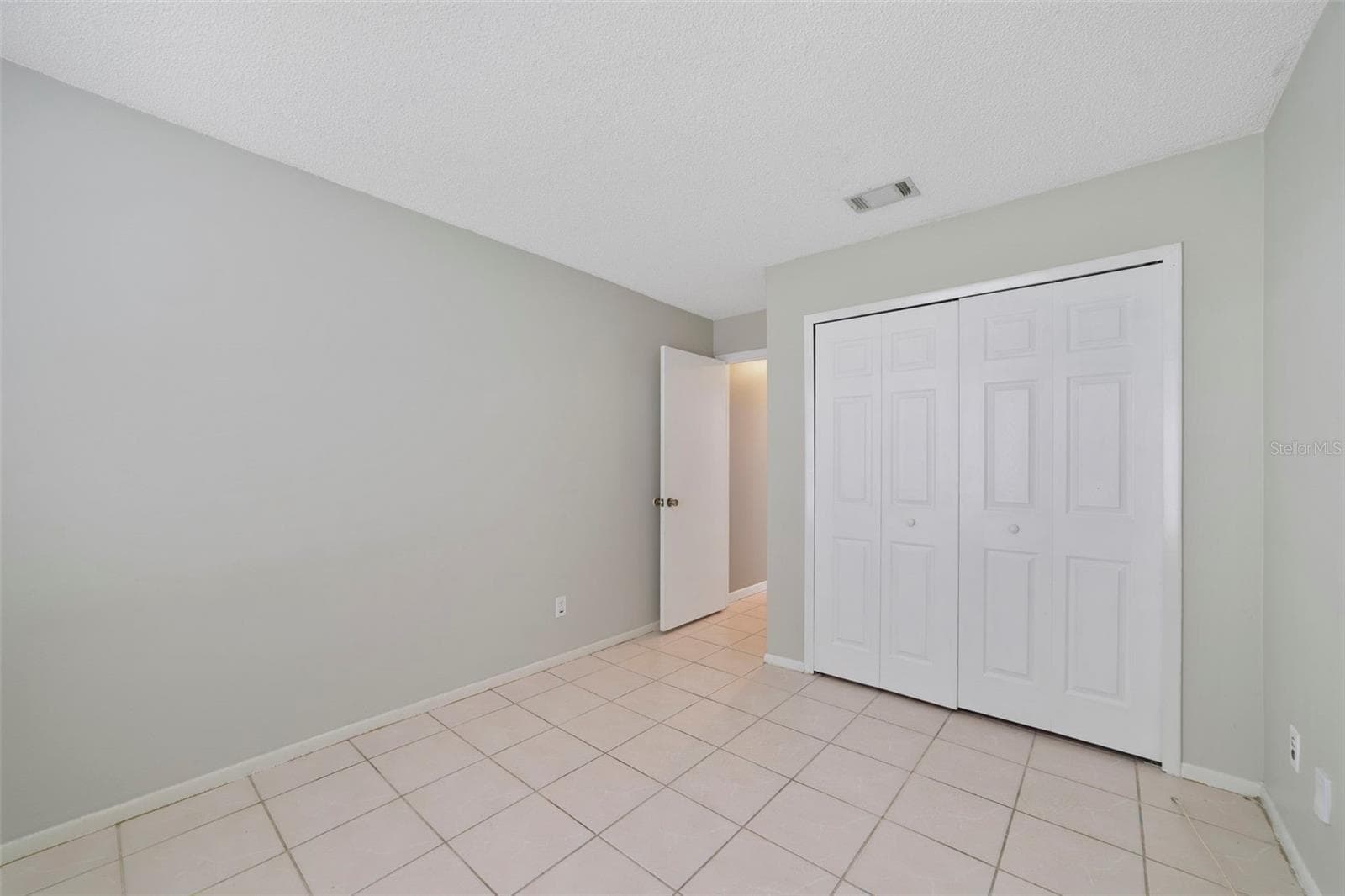 Bedroom 2 offers flexibility for use as a guest room, home office or hobby space. - 713 MEADOWSIDE CT, ORLANDO