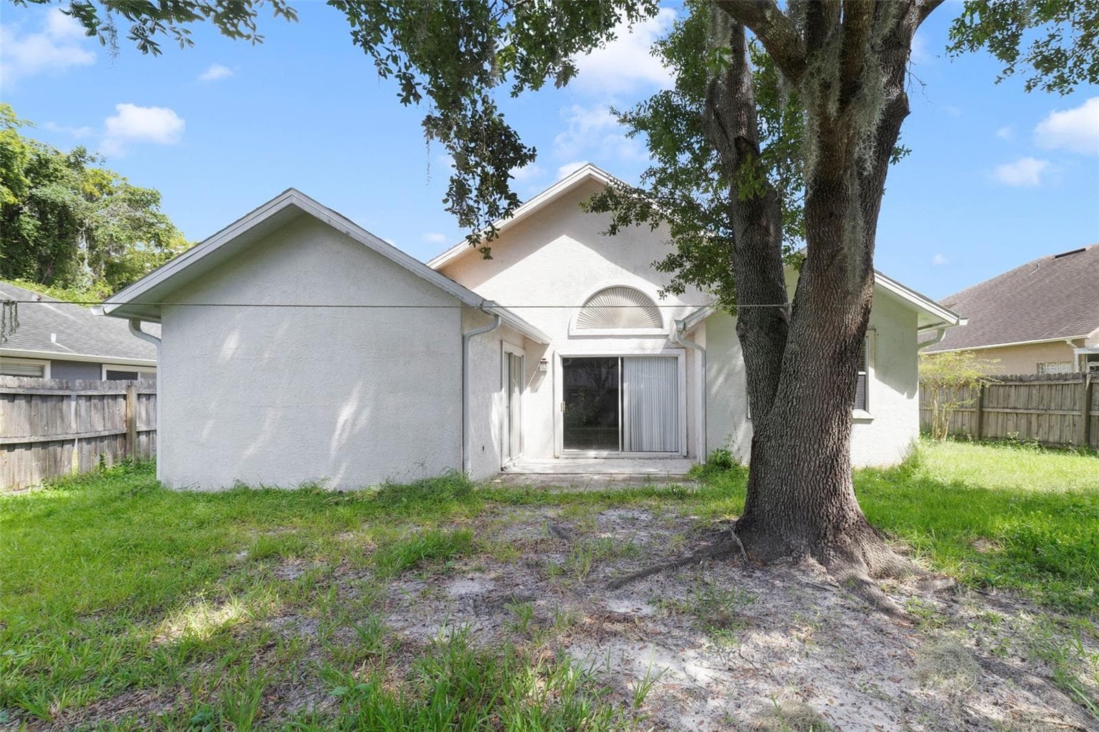 Step outside from the Living Room or Primary Bedroom and enjoy your own PEACEFUL OUTDOOR SPACE with nature offering a tranquil backdrop of CONSERVATION AND POND VIEWS. - 713 MEADOWSIDE CT, ORLANDO