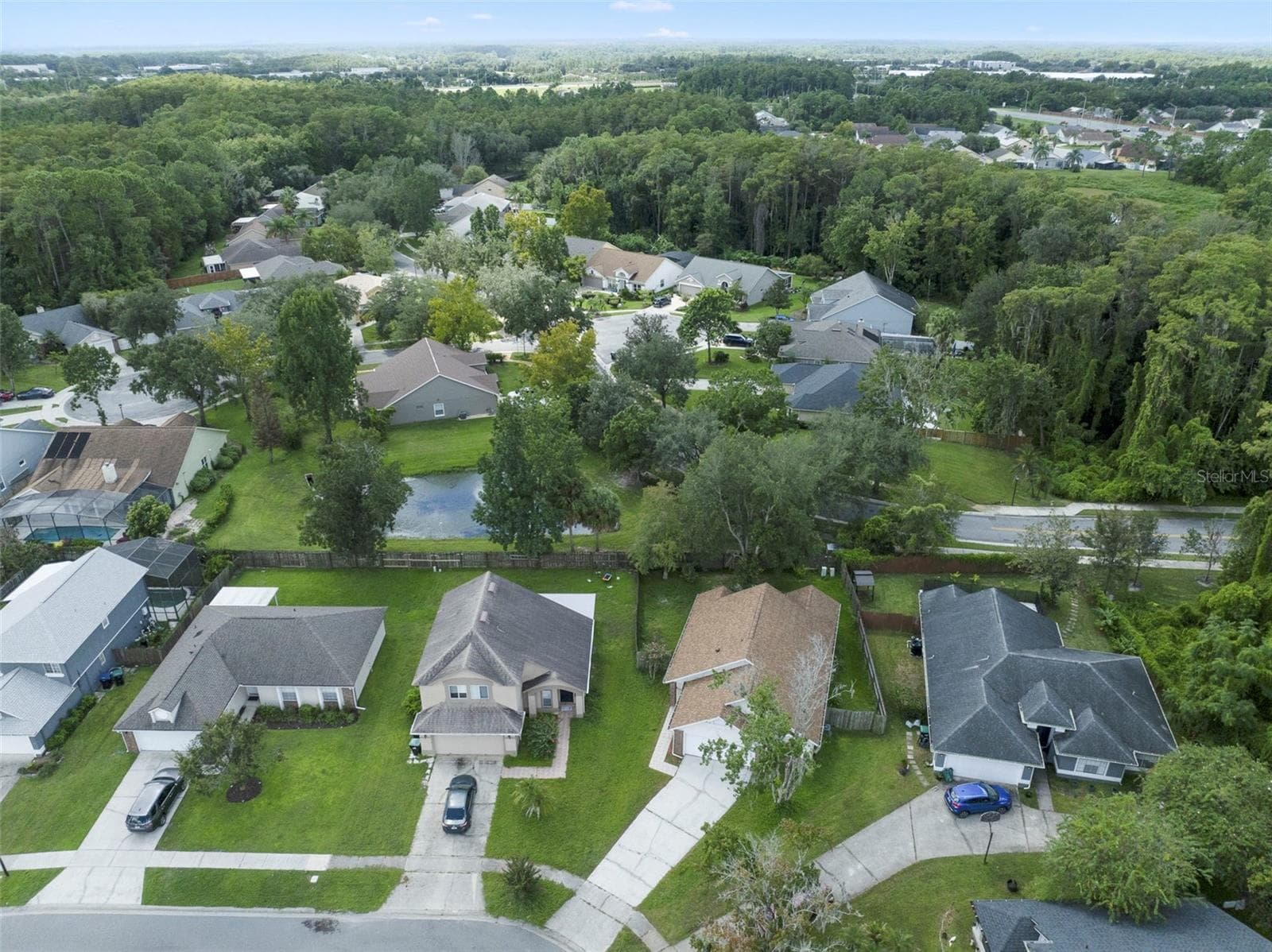 Aerial view of the front of the home - 713 MEADOWSIDE CT, ORLANDO