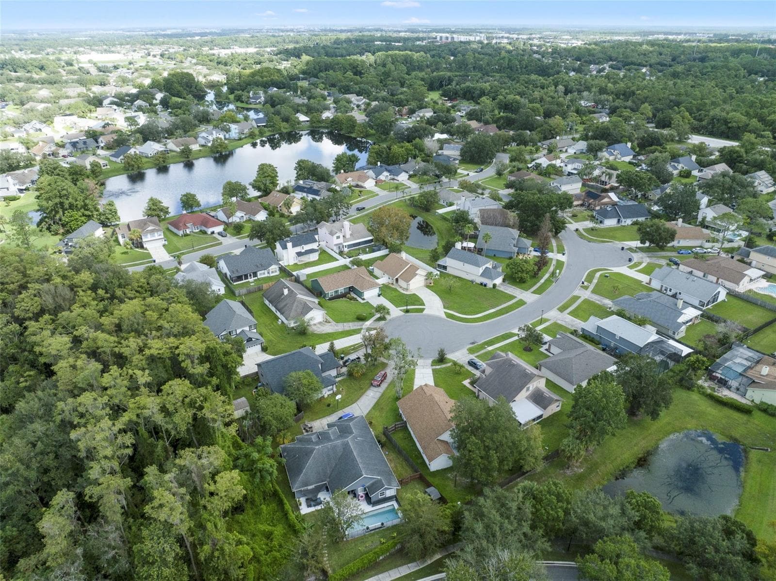 Aerial view of the home and community - 713 MEADOWSIDE CT, ORLANDO