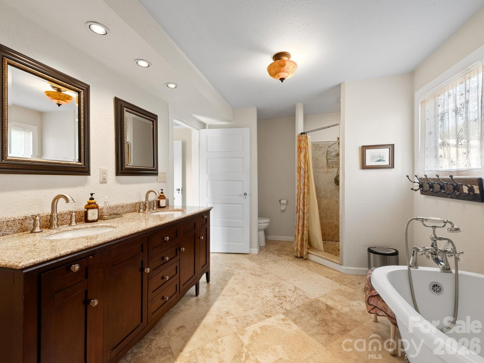 Primary bathroom ensuite features a freestanding tub and a shower - 157 J A Hampton Road, Rutherfordton