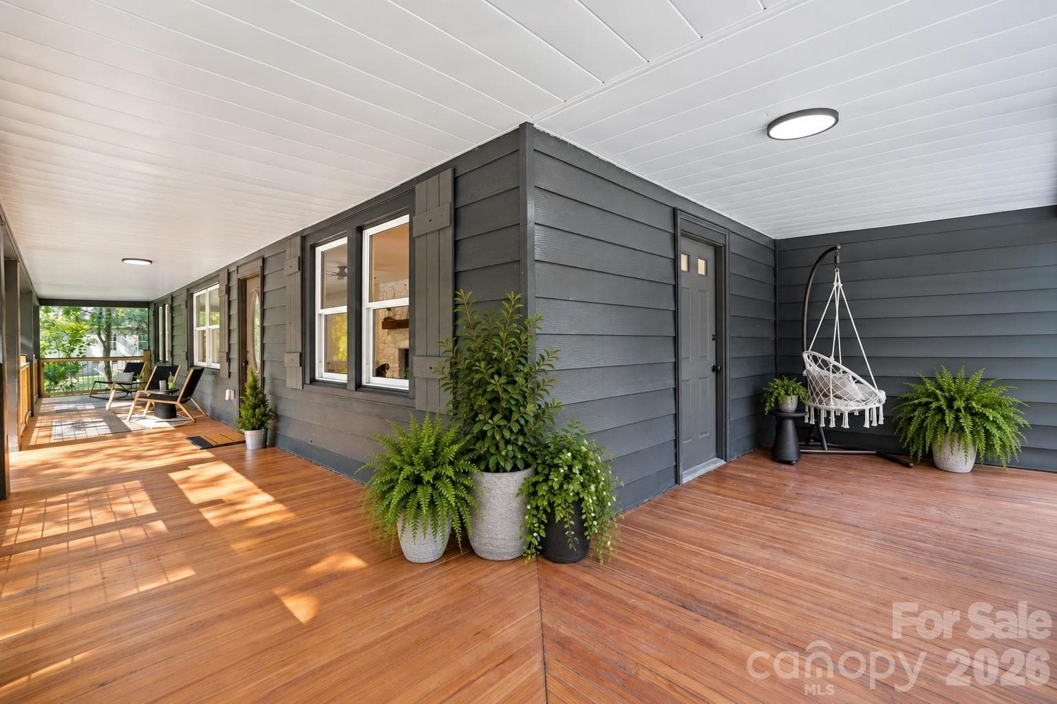 Covered wraparound porch provides the perfect setting for outdoor living. - 156 State Street, Asheville