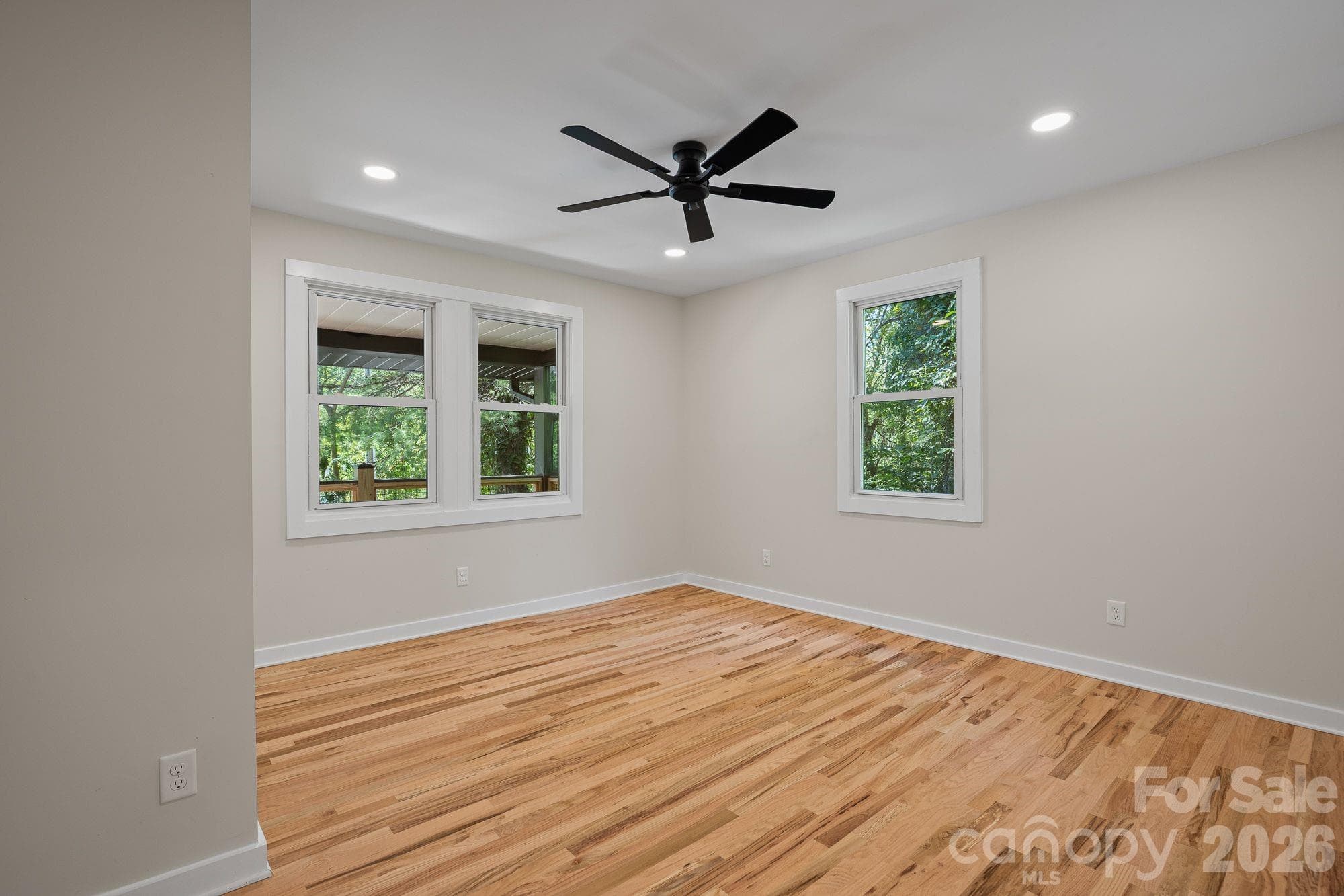 Second Bedroom: Main-level guest bedroom with private en-suite bath. - 156 State Street, Asheville