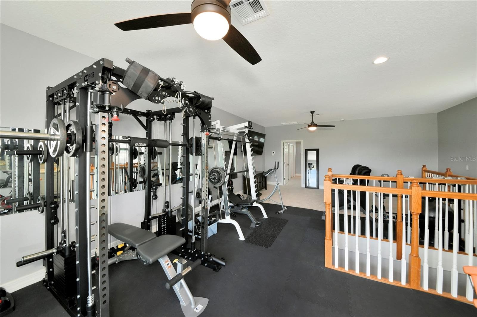 upstaris bonus room gym matting can be removed. plenty of space for a pool table, or home theater. - 817 MARITIME CT, BRADENTON