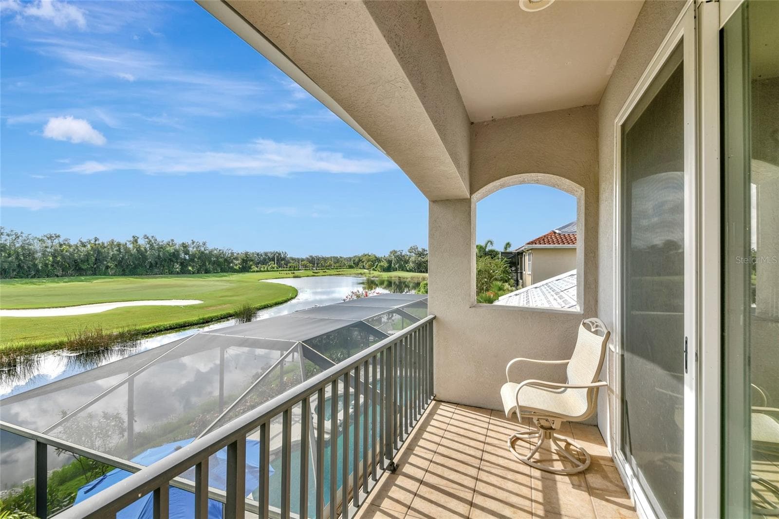 upstairs balcony with golf course views - 817 MARITIME CT, BRADENTON
