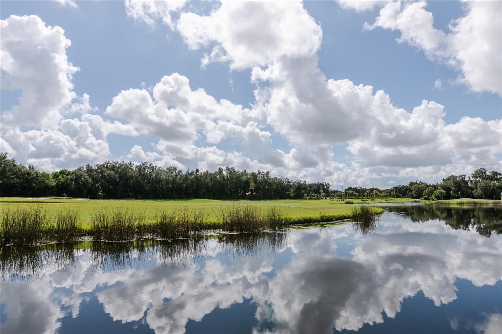 lake and golf course views - 817 MARITIME CT, BRADENTON