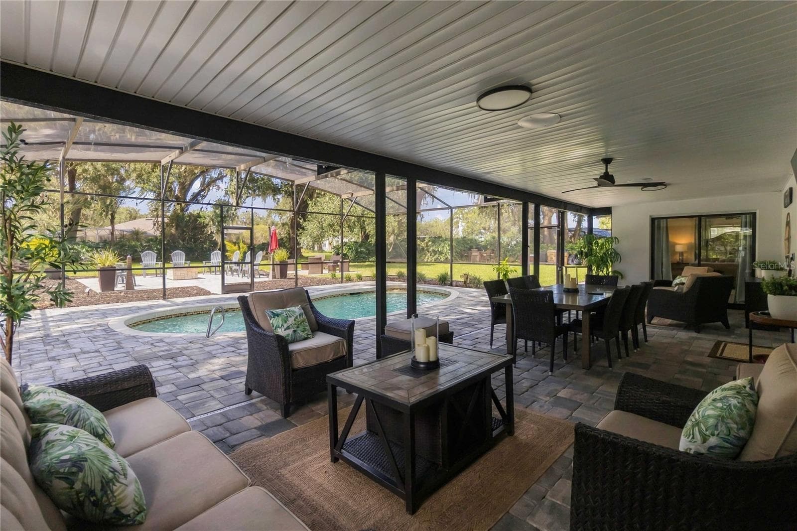 Patio and screened in pool - 3180 WHISPER WIND DR, ST CLOUD