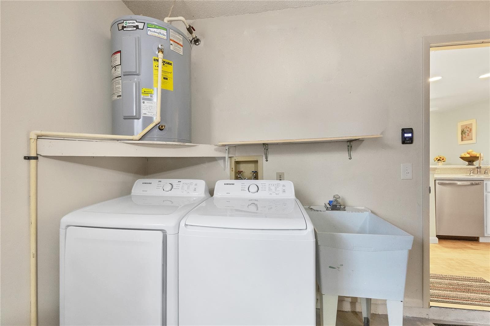 Washer and dryer area off kitchen - 4021 OAKHURST DR #3121, SARASOTA