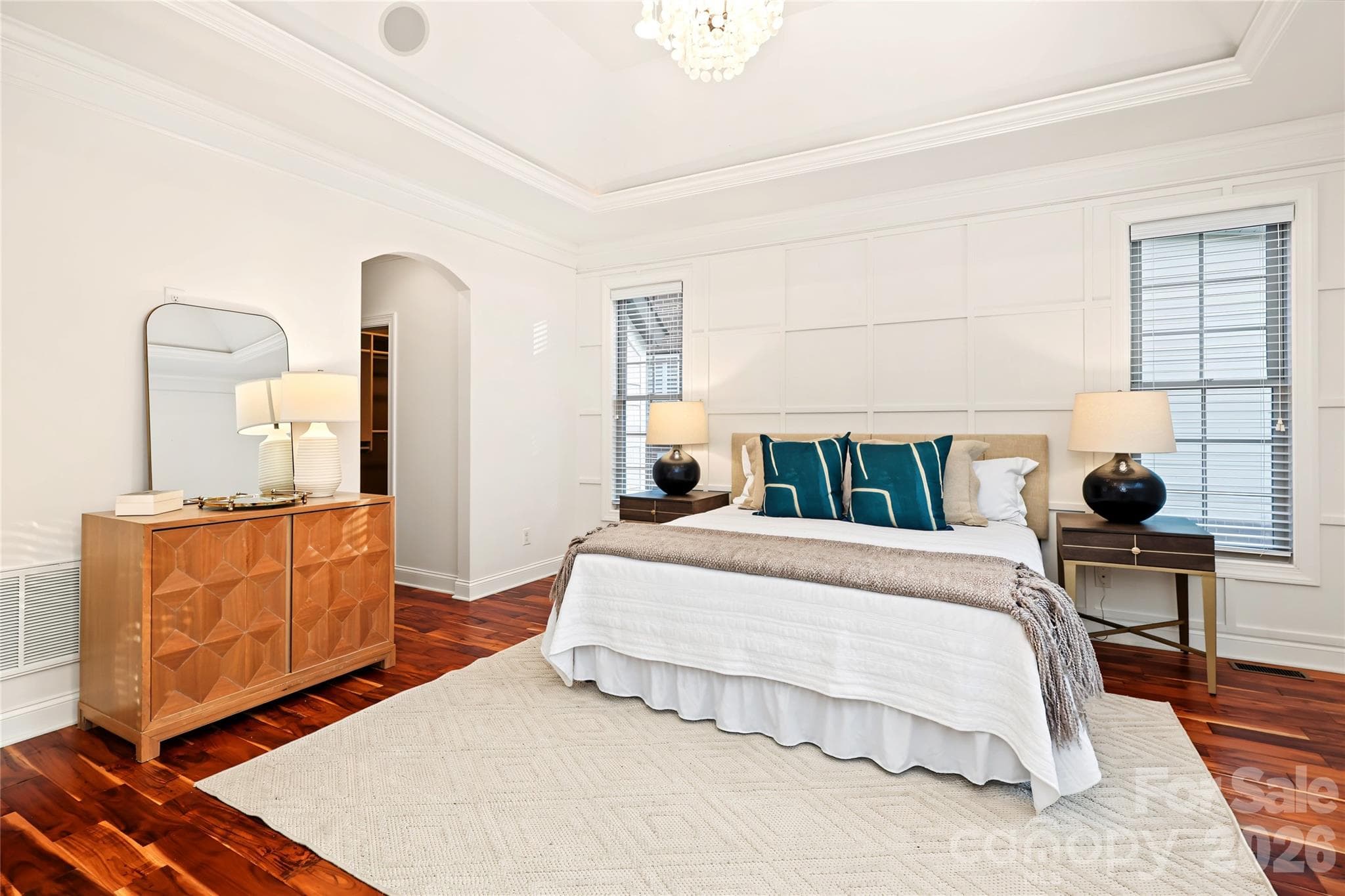 Vaulted ceilings and accent wall in the Primay Suite. - 4934 Spalding Place, Charlotte