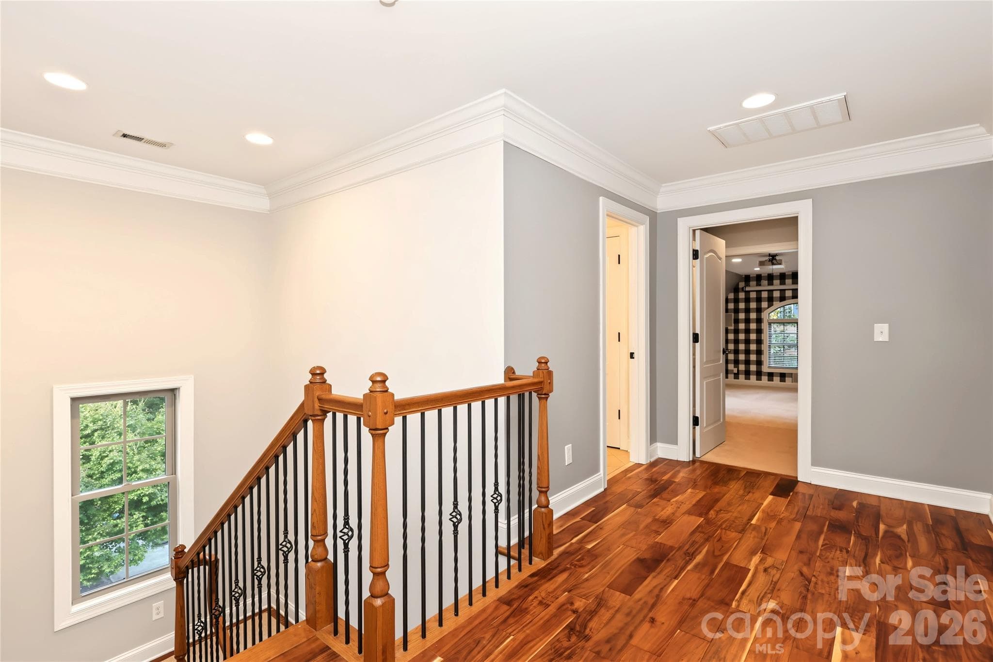 Upstairs landing looking into the bed/bonus room and upstaris bath. - 4934 Spalding Place, Charlotte