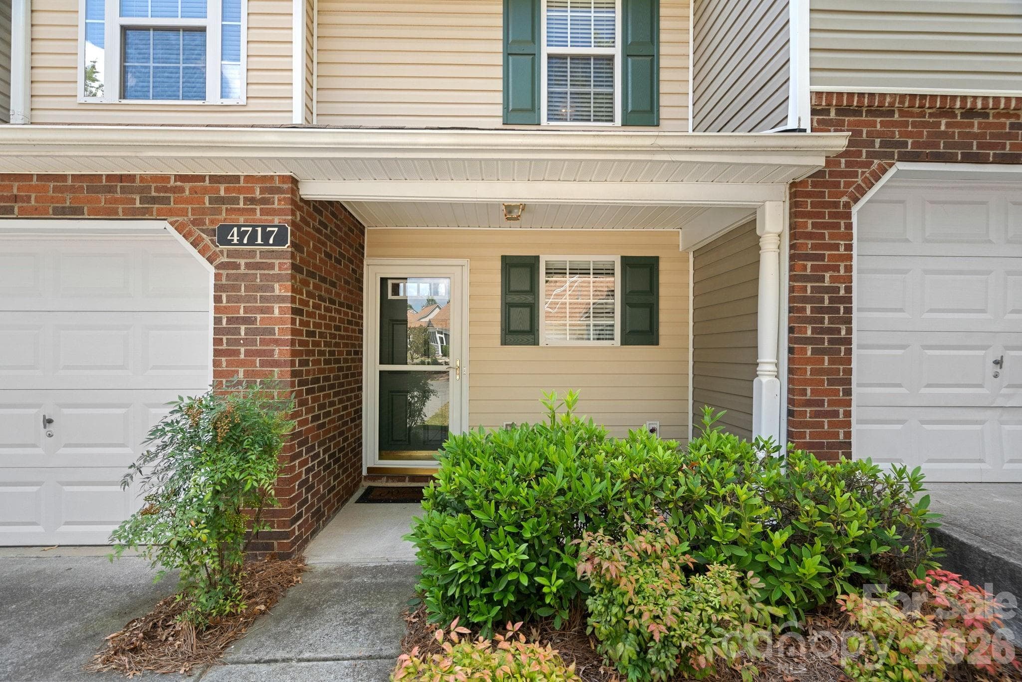 Covered porch and attached garage - 4717 Grier Farm Lane, Charlotte