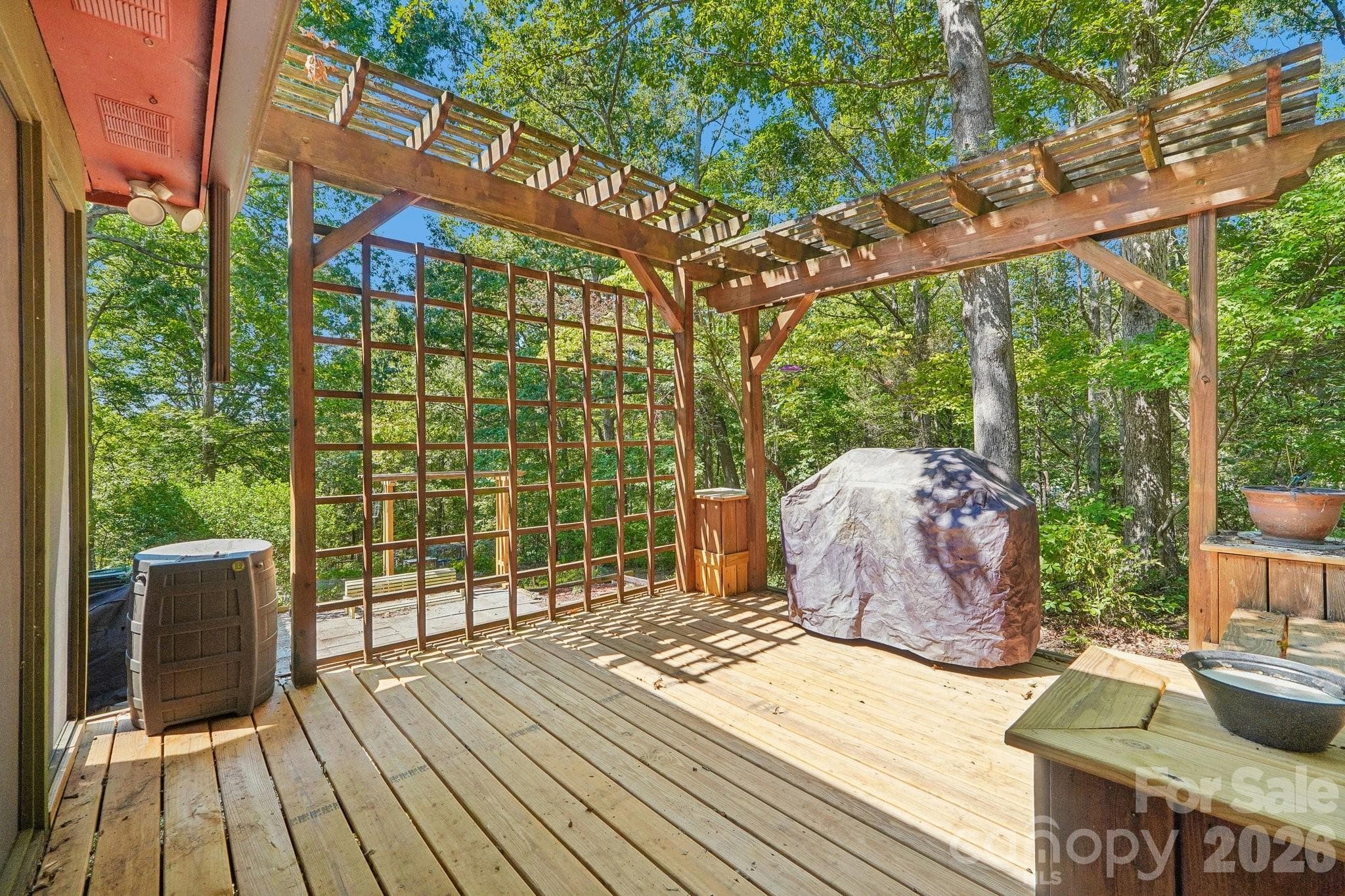 Plenty of sunlight on the open deck with a screened-in porch as well! - 2701 Cedar Trail Lane, Wingate