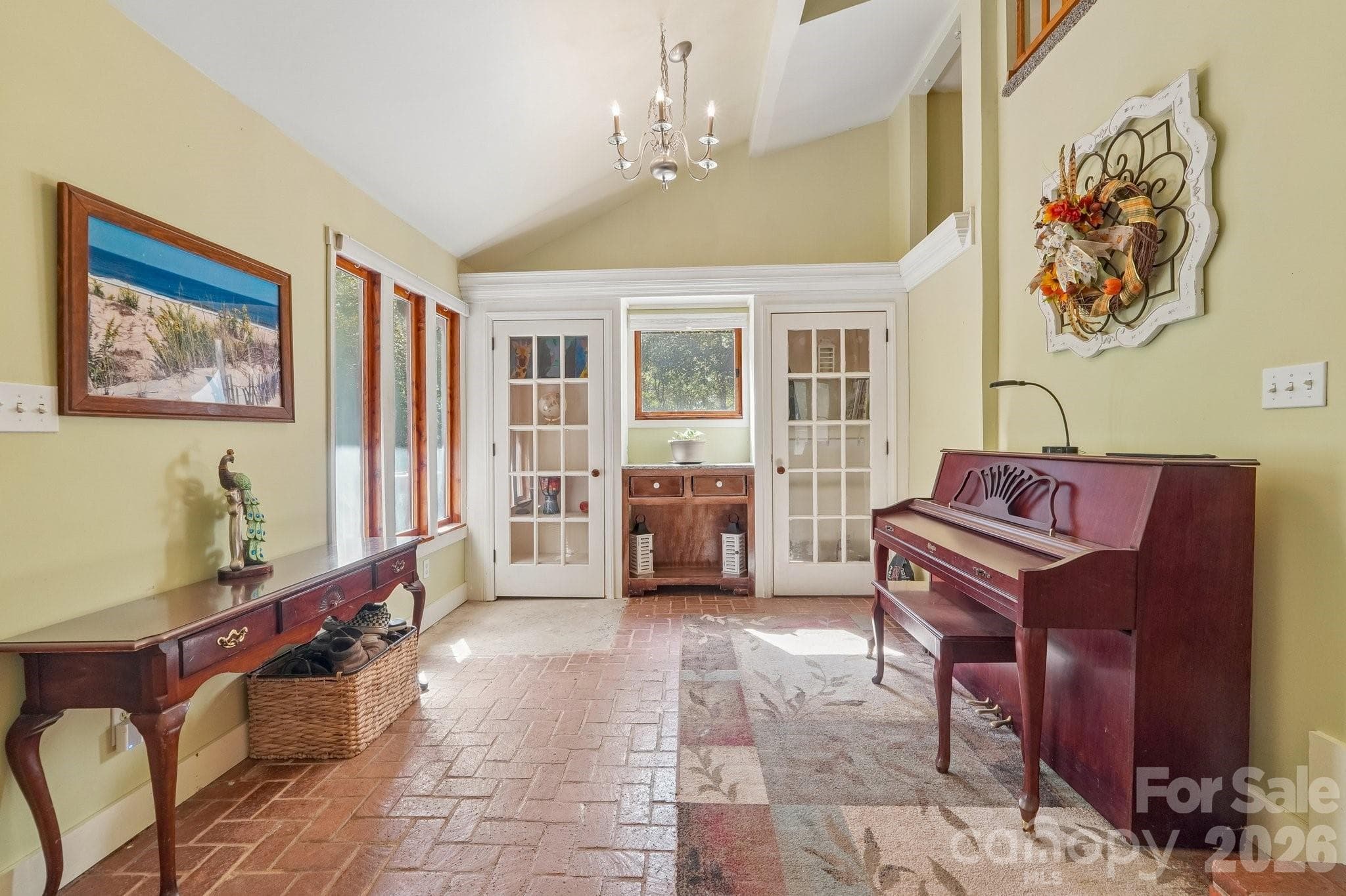 Spacious 2-story, entry-way with brick flooring. - 2701 Cedar Trail Lane, Wingate