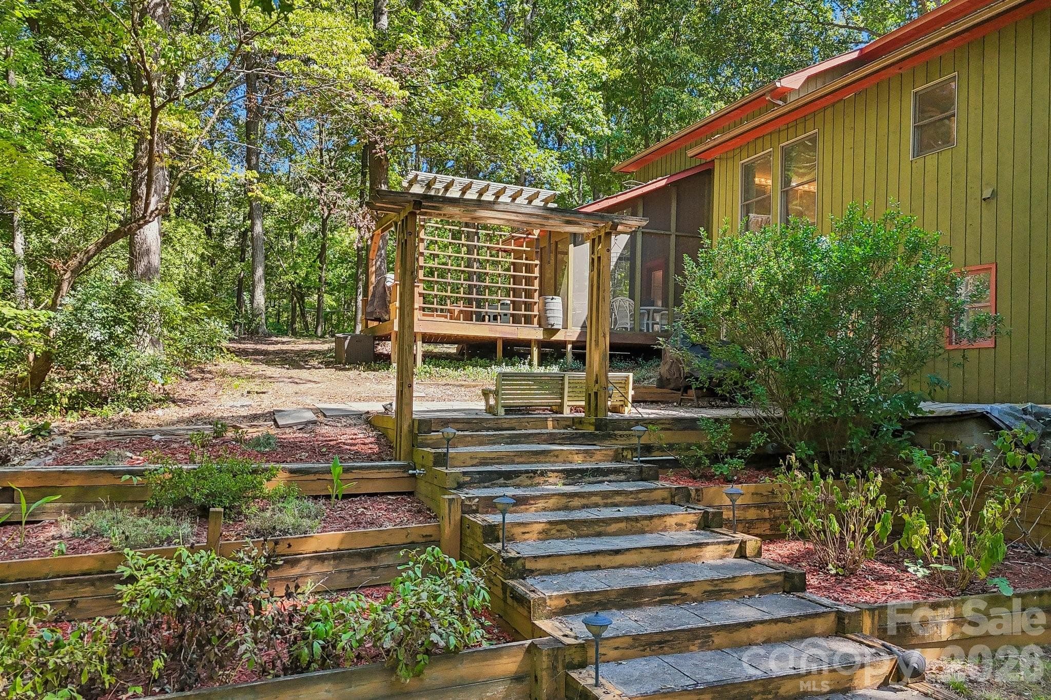 Backyard garden/deck, perfect for entertaining! - 2701 Cedar Trail Lane, Wingate