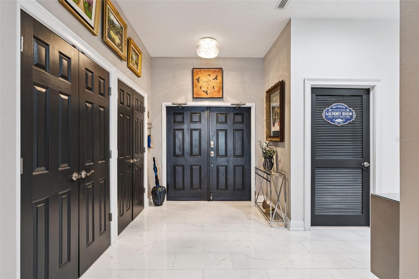 Foyer of residence with double custom closets. - 225 W SEMINOLE BLVD #603, SANFORD