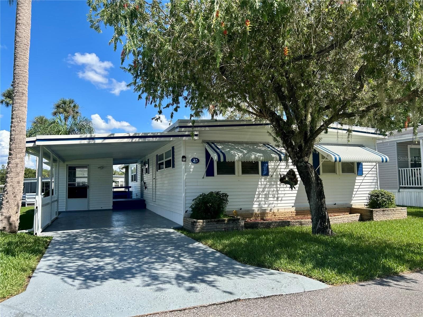 Mobile Home at 33 COCOS PLUMOSA DR, EUSTIS, photo 6 of 49