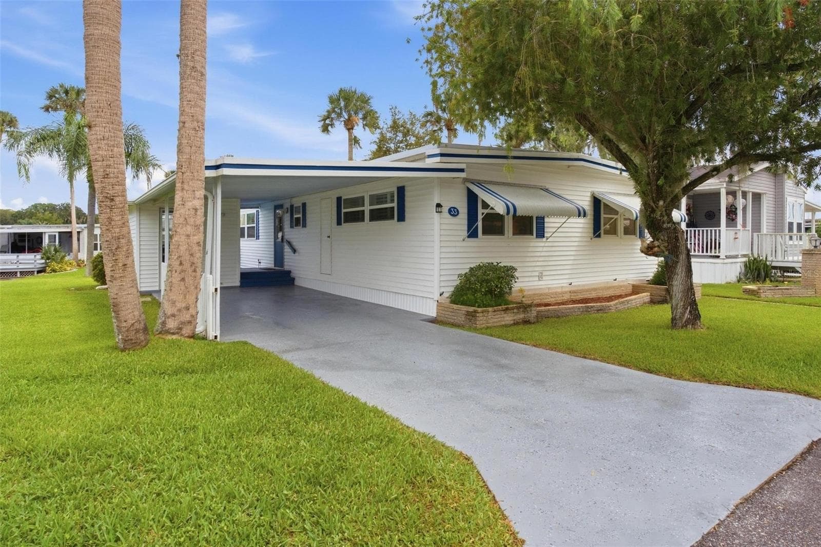 Mobile Home at 33 COCOS PLUMOSA DR, EUSTIS, photo 7 of 49