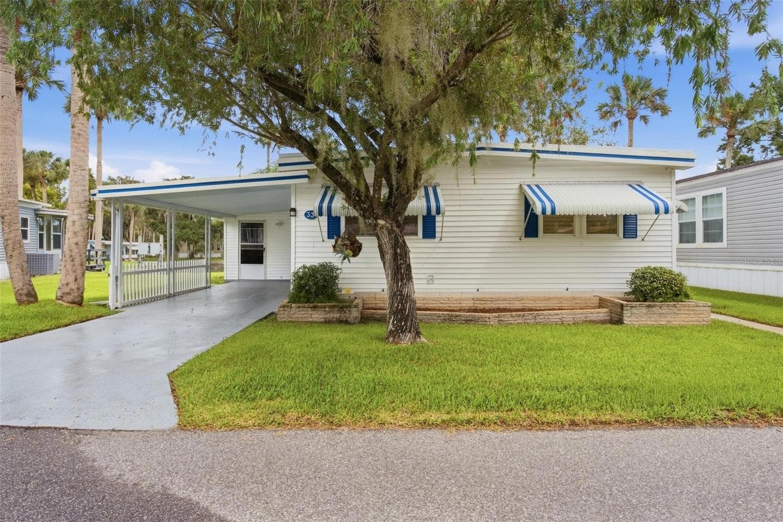 Mobile Home at 33 COCOS PLUMOSA DR, EUSTIS, photo 8 of 49