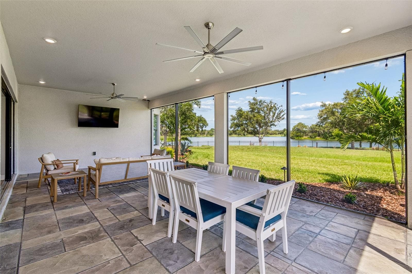 Living Room & Dining Area with Lakeview - 192 CASAVISTA DR, POINCIANA