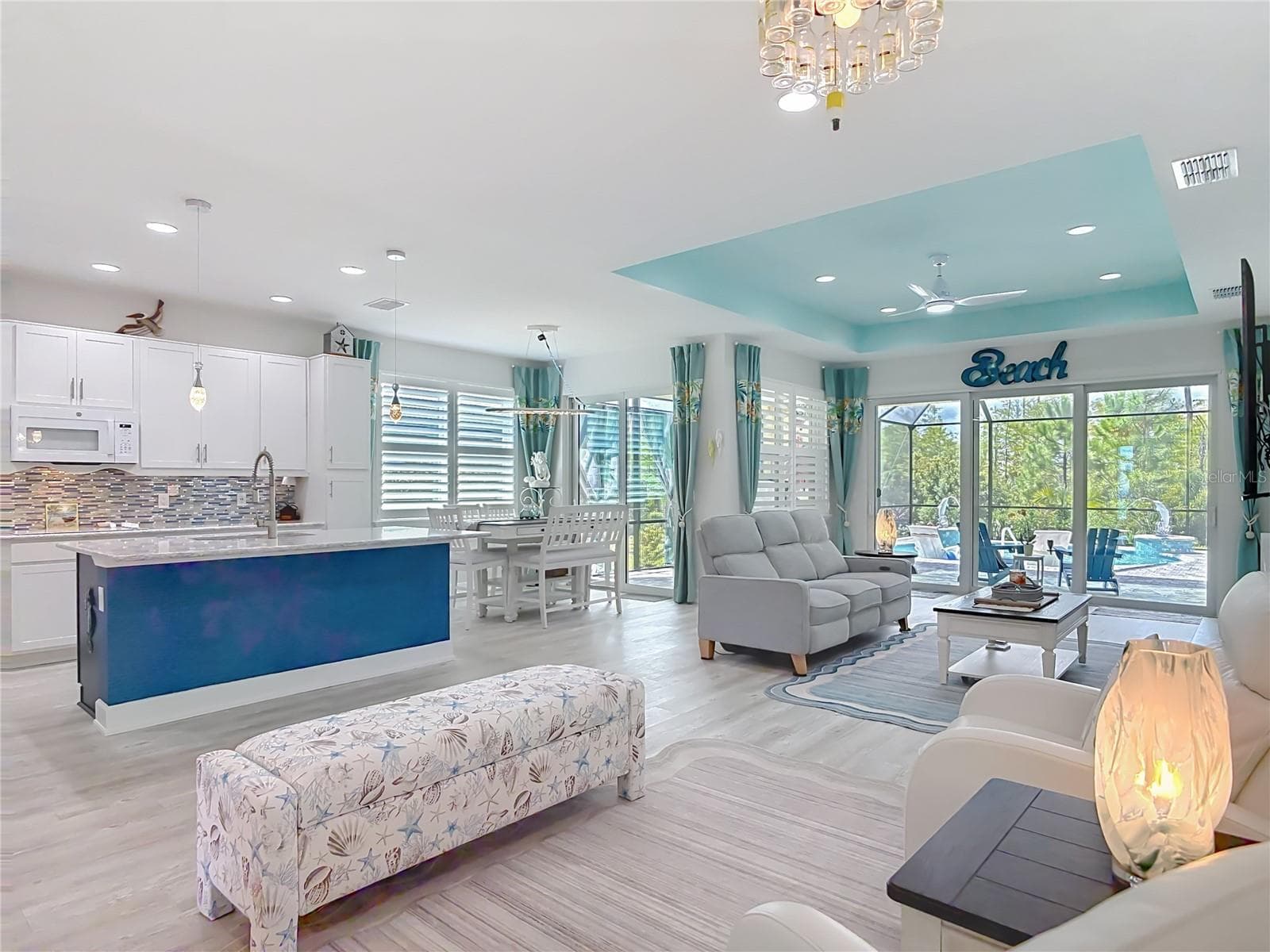 View of Kitchen Island from Sitting Area - 213 BLUE STARFISH PL, DAYTONA BEACH