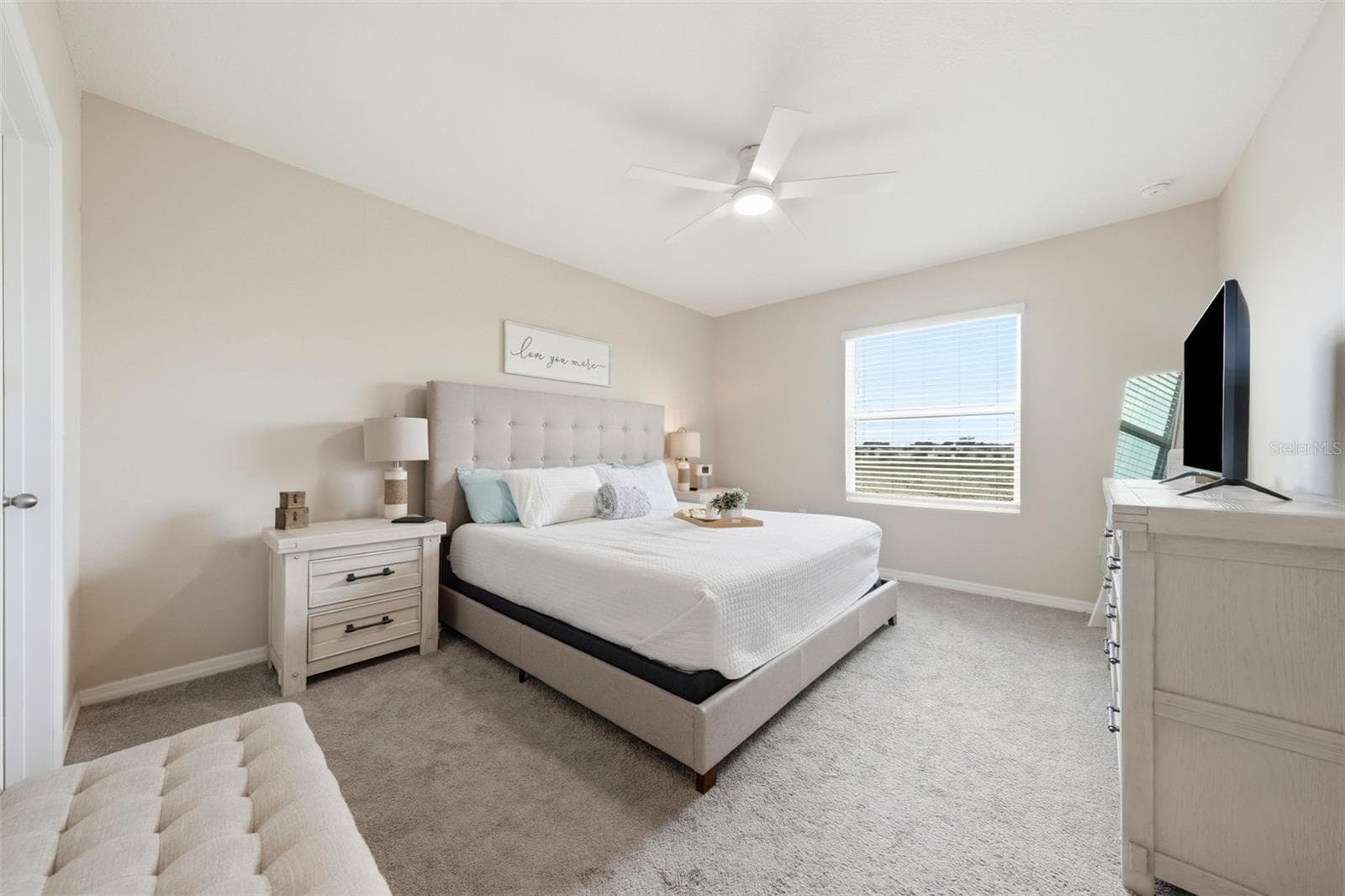 Primary Bedroom has plenty of room for a King bed, 2 dressers, 2 nightstands and more... an additional walk-in closet. - 5238 DRAGONFLY DR, WILDWOOD