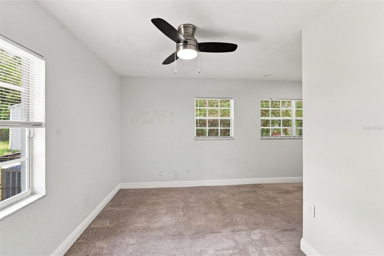 Primary Bedroom with Natural Light - 8326 ENDIVE AVE, TAMPA