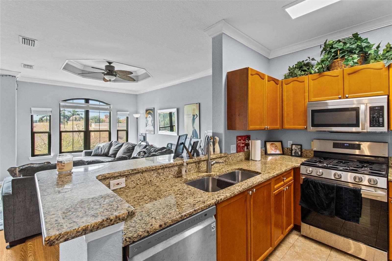 open kitchen and living rooms - 2709 VIA CIPRIANI #532B, CLEARWATER