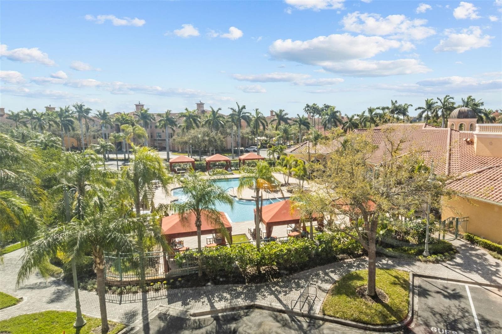 View of pool from guest bedroom - 2709 VIA CIPRIANI #532B, CLEARWATER