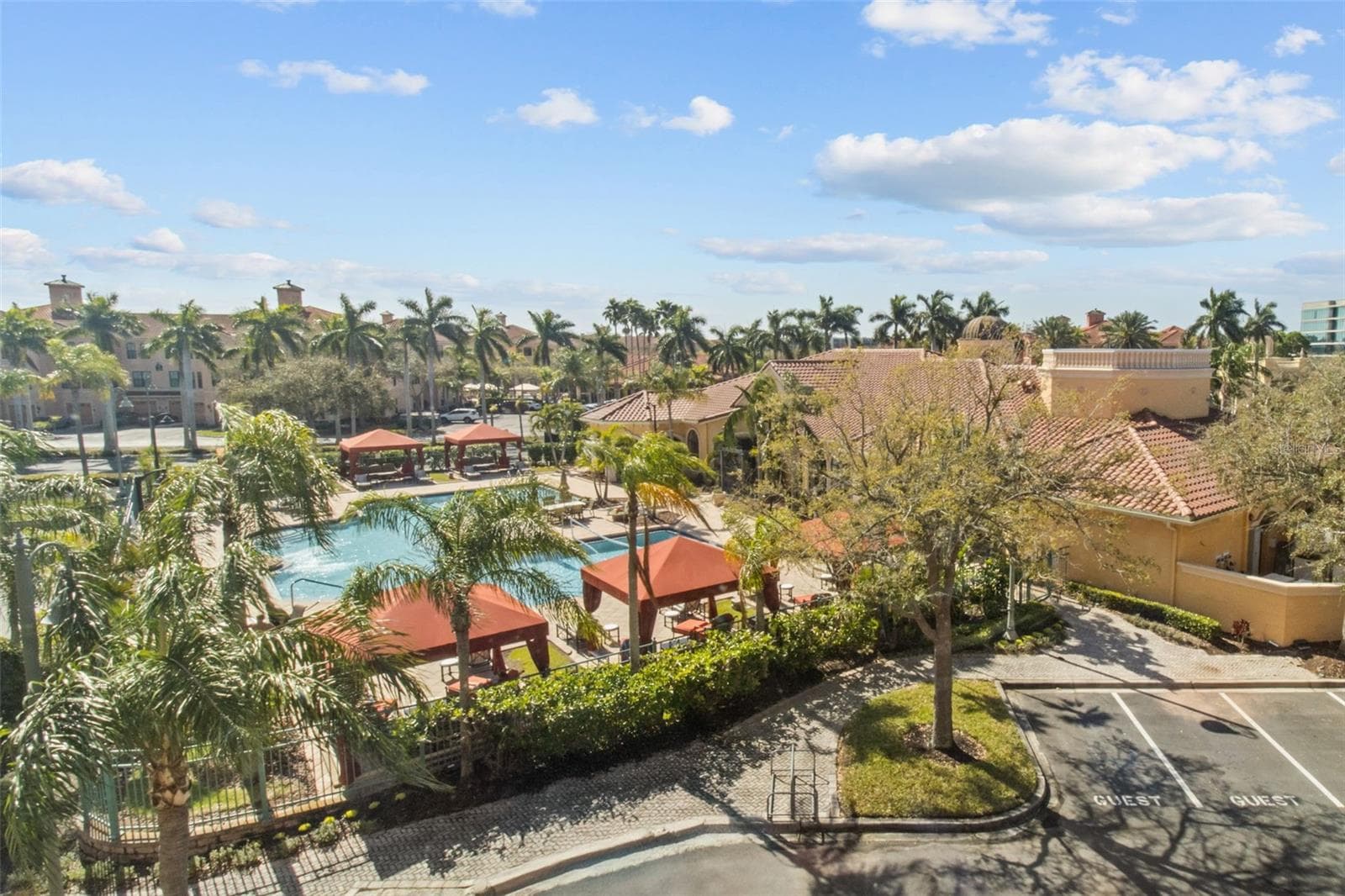 View of pool from primary bedroom - 2709 VIA CIPRIANI #532B, CLEARWATER