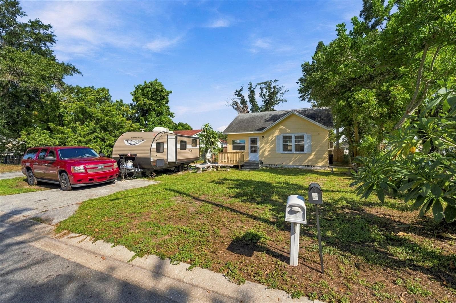 Front exterior with driveway - 3939 45TH AVE N, ST PETERSBURG