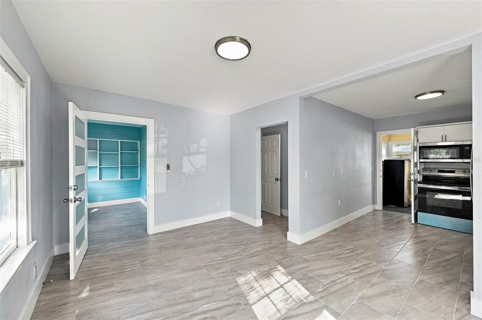 Front residence – open living and kitchen area - 3939 45TH AVE N, ST PETERSBURG