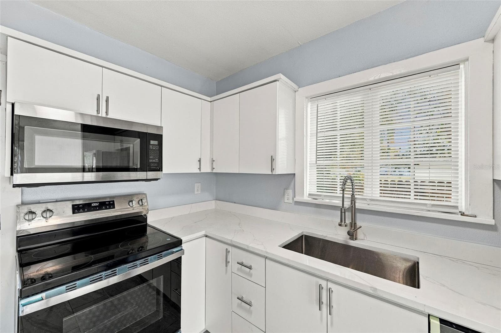 Front residence – kitchen, additional view - 3939 45TH AVE N, ST PETERSBURG