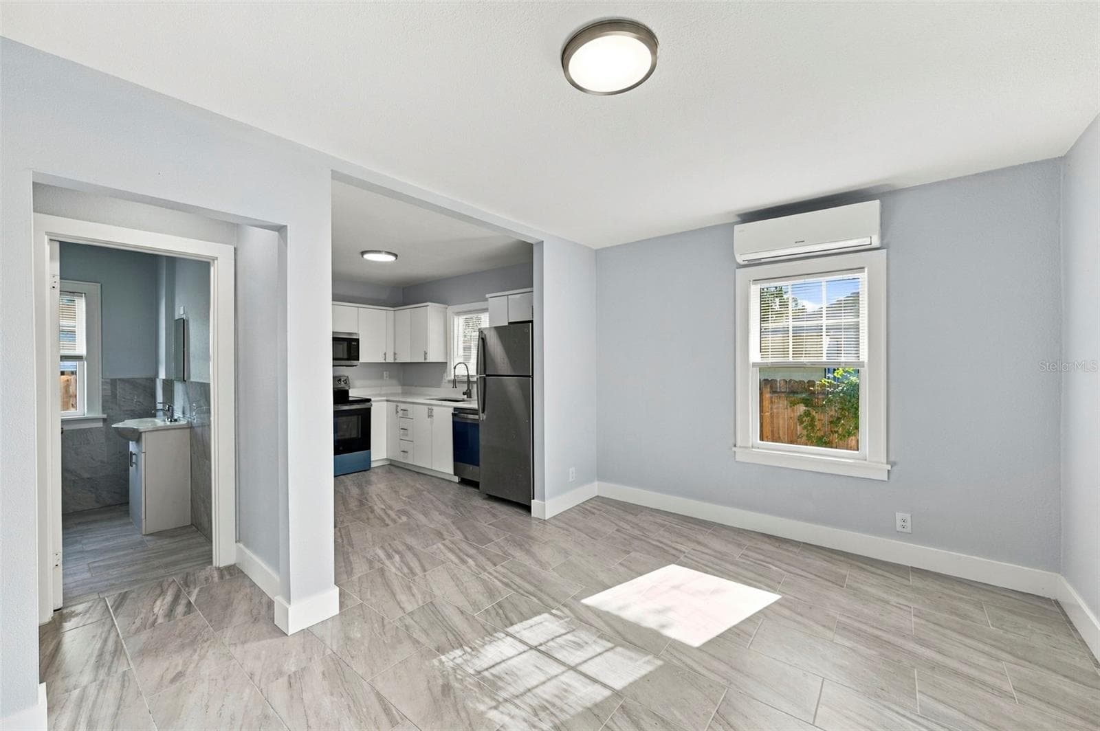 Front residence – remodeled living area - 3939 45TH AVE N, ST PETERSBURG