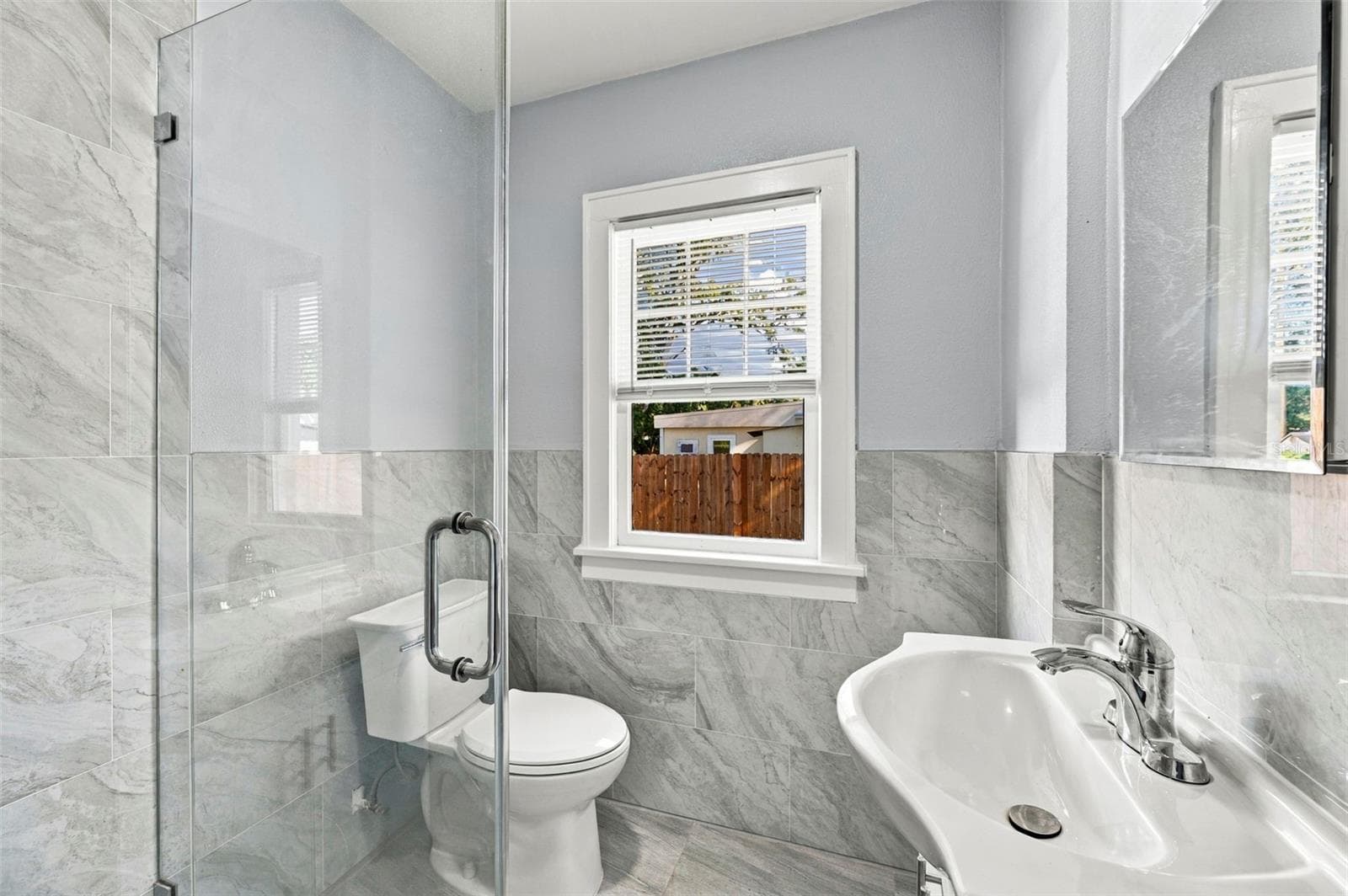 Front residence – remodeled bathroom - 3939 45TH AVE N, ST PETERSBURG