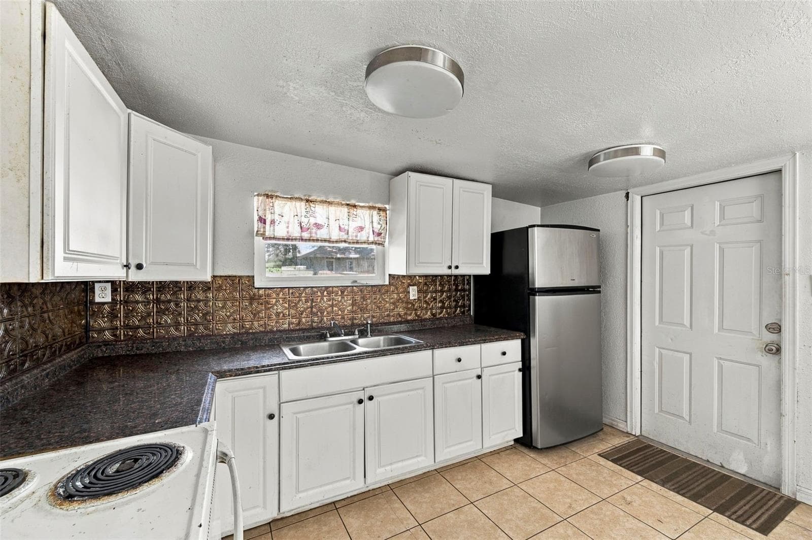 Rear residence – kitchen, additional view - 3939 45TH AVE N, ST PETERSBURG