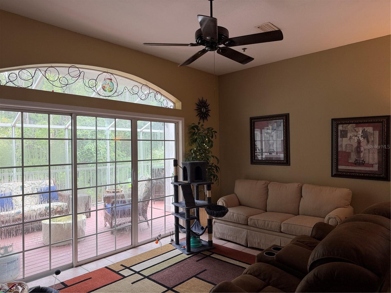 Living room on main level - 2015 VISTA DEL SOL CIR #108, LUTZ