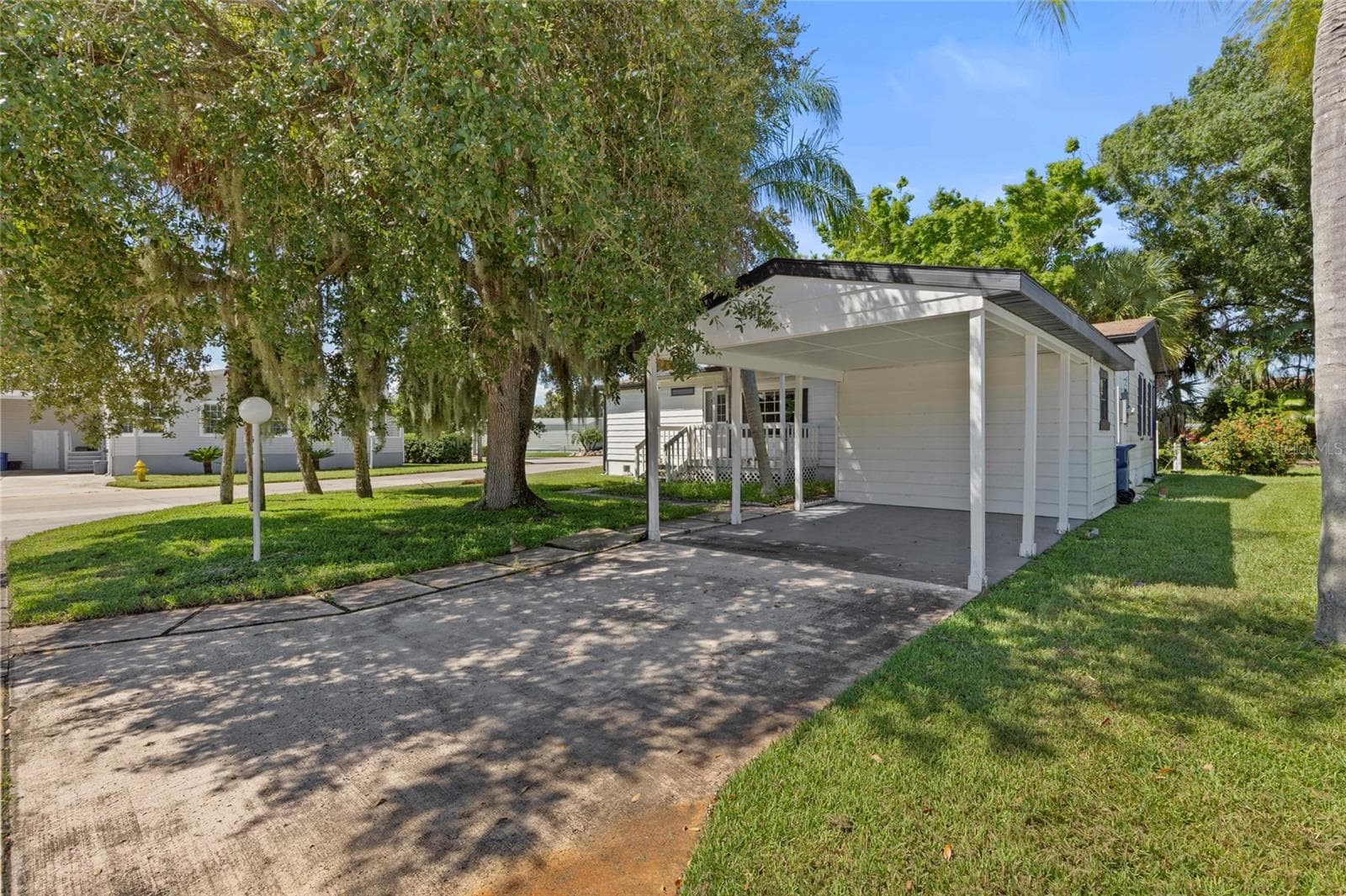 Manufactured Home at 61 MOURNINGDOVE CT #0, ELLENTON, photo 3 of 29
