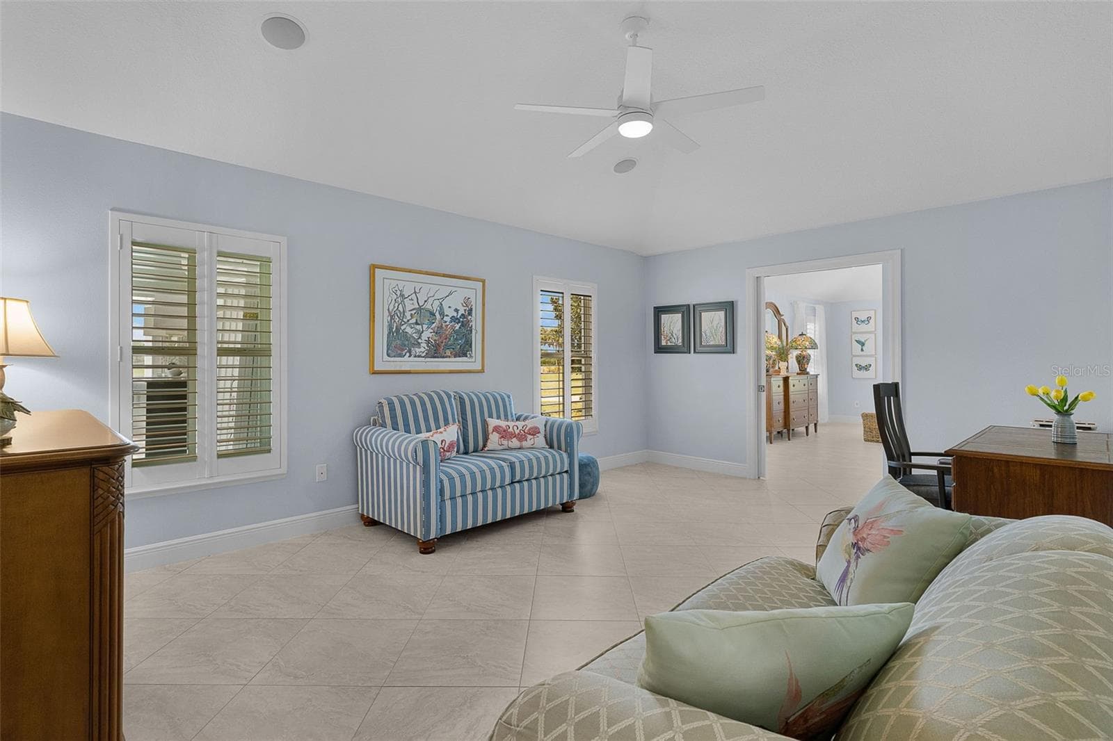 2nd primary bedroom with its own full master bathroom and huge walk-in closetpocket doors open/currently used as an office - 1744 GIST CT, THE VILLAGES