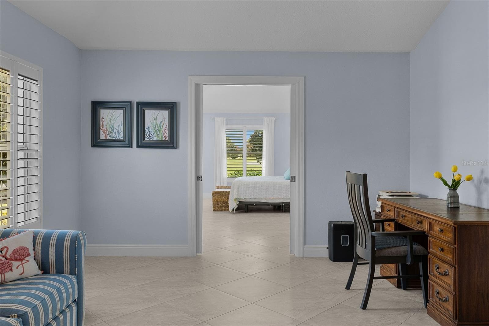 double primary suite pocket doors open - 1744 GIST CT, THE VILLAGES